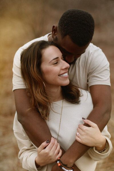 Interracial couple hugging