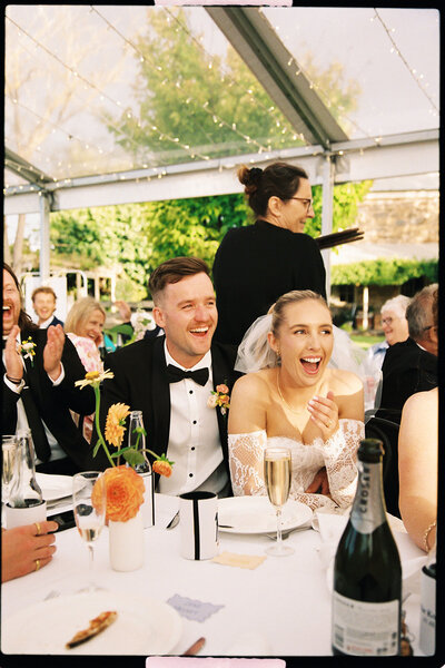 bride and groom embrace on wedding day