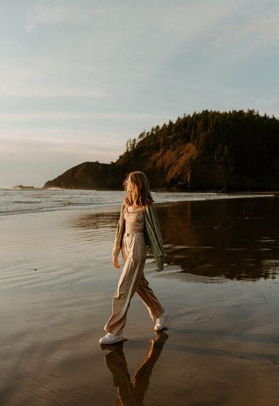 Emily Noelle Photography portrait of girl walking on beach