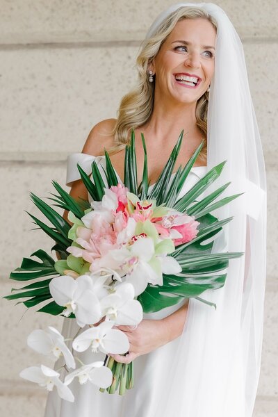 wedding bouquet with white and pink roses with greener