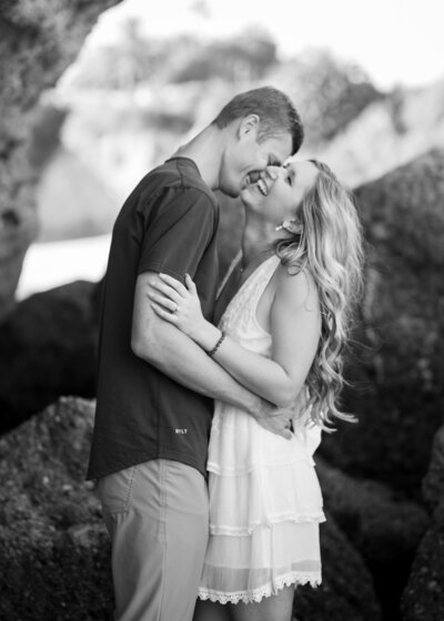 romantic black and white beach engagement photo
