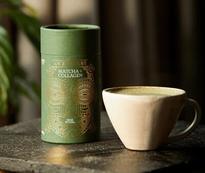 Ancient + Brave Matcha + Collagen tub beside a matcha latte – a powerful start to your day for energy and skin support.