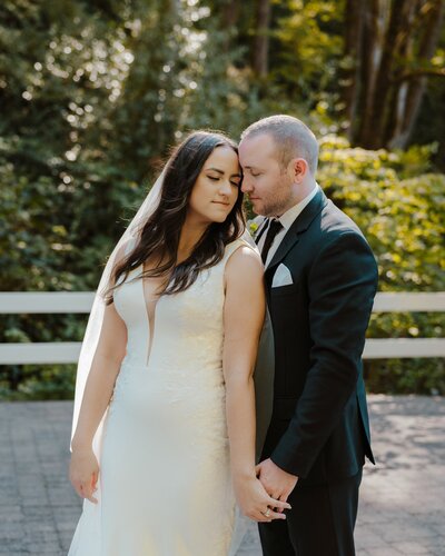 bride and groom embracing