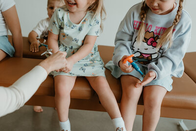 children on chiropractic table