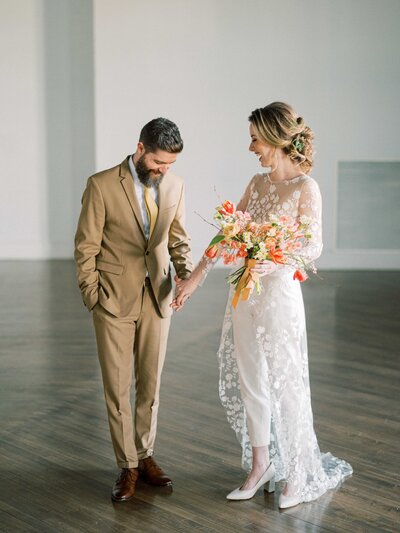 Bride and groom walk up memorial steps at their DC wedding