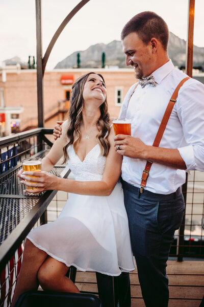 A couple celebrates at Ouray Brewing after their elopement.