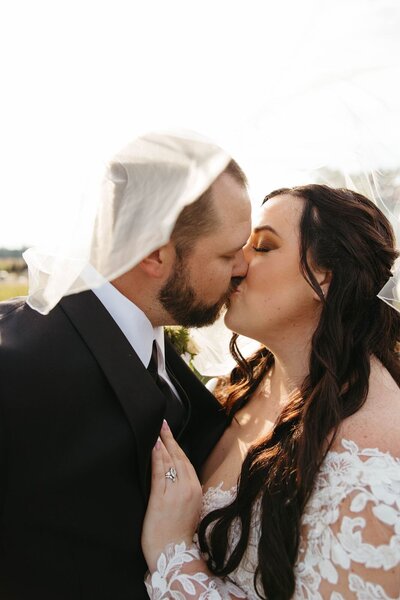 Bride and groom kissing portrait in Maryland