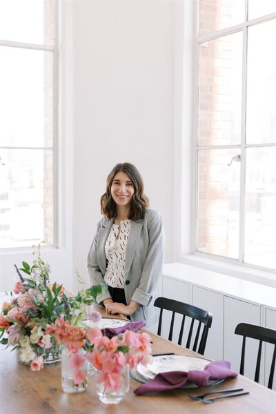 Sarah standing behind tablescape mockup design