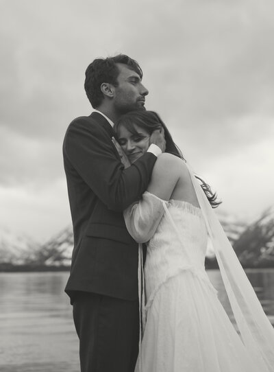 elopement in grand teton national park, bride and groom embracing at colter bay