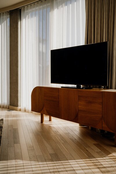 TV on a mid-century modern consul