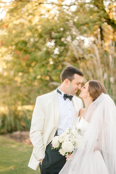 Indianapolis wedding photographer captured image of bride and groom smiling at Woodstock Country Club