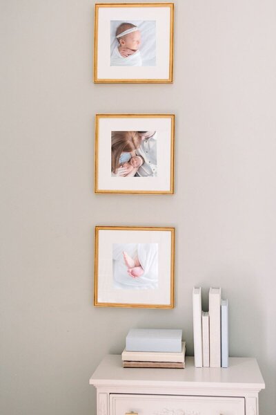 Framed newborn photography savannah portraits hanging on the wall