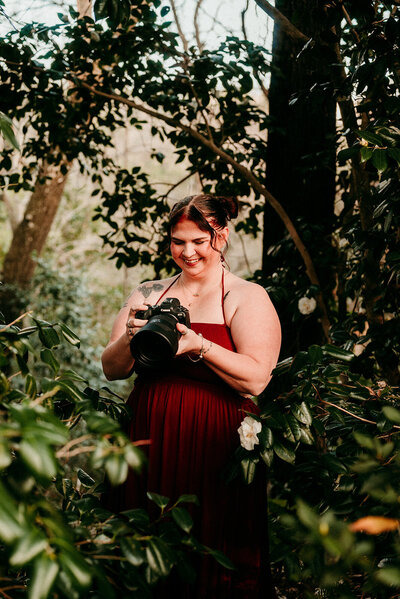 Portrait of the St. Augustine photographer smiling outdoors.