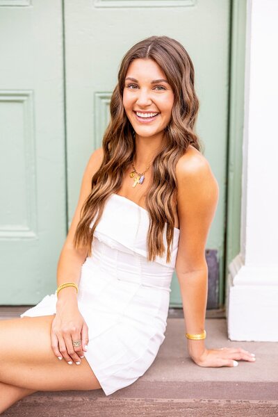 College graduate portrait session at the College of Charleston, celebrating milestones with timeless elegance