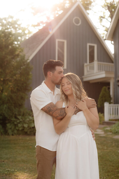 couple holding each other on the dock