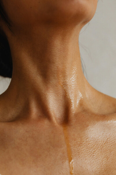 skin on woman's neck with moisture