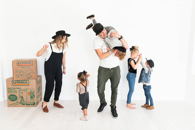 lifestyle photo of family playing together