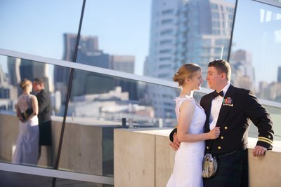 Couple standing on balcony at San Diego Central Library Wedding