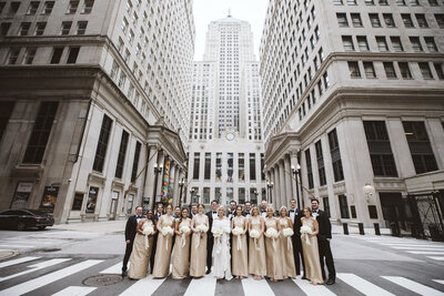 a couple with their wedding party in downtown chicago