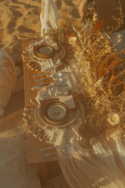 table set up for wedding in the sand dunes