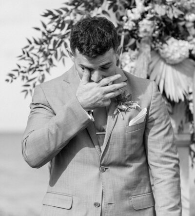 Emotional moment of the groom seeing his bride.