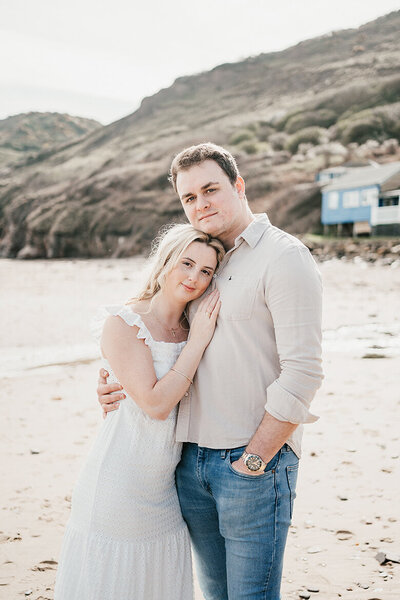 Couple in romantic pose at beach
