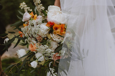 bride holds bouquet