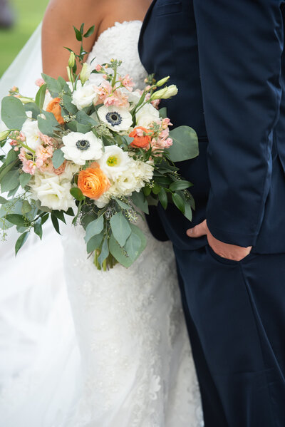 Bride and groom walk up memorial steps at their DC wedding