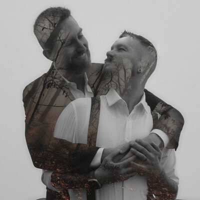 LGBTQ+ couple holding and looking at each other