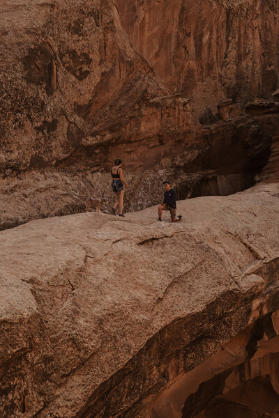 Cinematic adventure engagement photography featuring real, unscripted love.