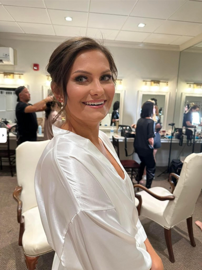 Expert hair styling by a Houston makeup artist enhancing natural beauty for a stunning bridal look.