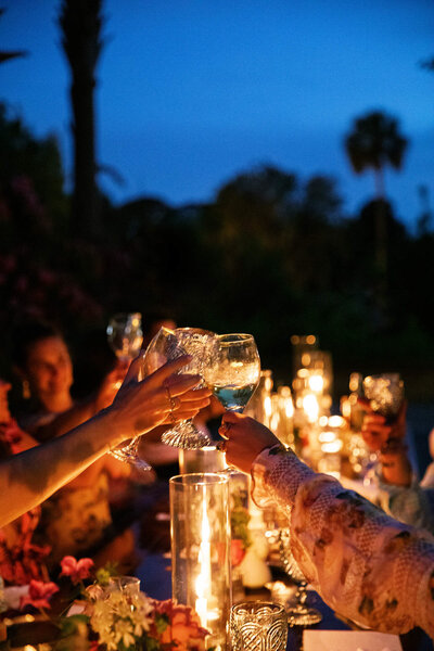 Wedding guests enjoying dinner after a Tuscan group excursion. 