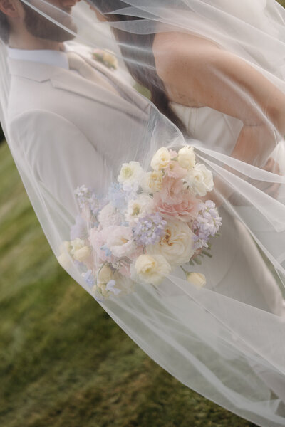 Kylie sitting on steps of college, for grad photos