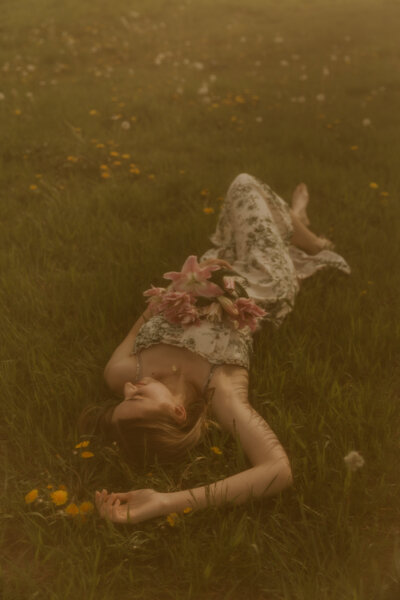 Aesthetic Senior Photos in Lanesboro, MN Laying on the Ground