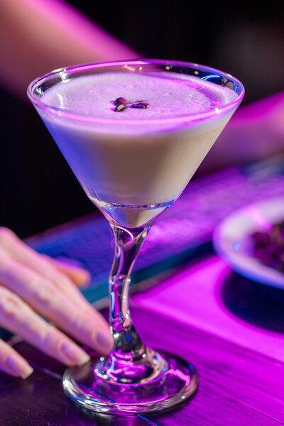 A cocktail in a fun martini glass 