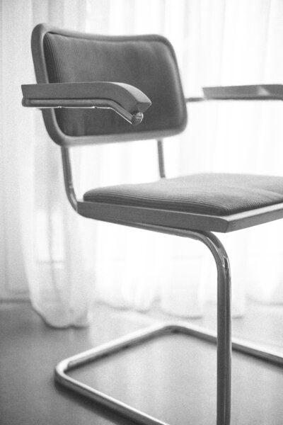 Light, neutral trauma‑informed therapy room interior representing online individual healing space Therapy with Jessie in Los Angeles