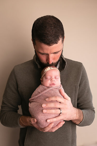 In-home lifestyle newborn photo by Ann Marshall