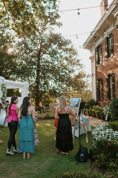 guests watching live painting