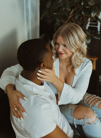 An intimate couples session between Kennedy and Cahlil announcing their pregnancy to their friends and family. They enjoyed a cozy, home-inspired session at a studio in St. Paul, Minnesota