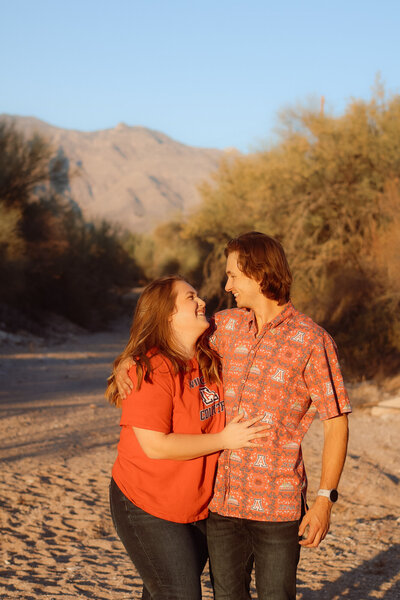 Couple smiling at each other in Tuscan, Arizona having a candid moment 