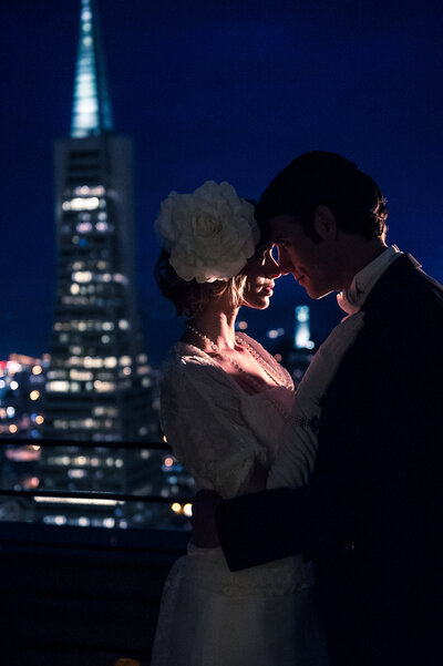 wedding-bride-groom-nighttime-san-francisco-skyline-