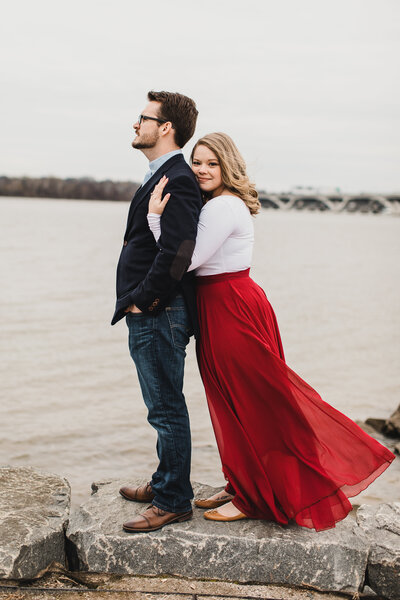 Wedding Photographer, couple standing next to the ocean