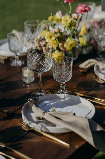 Yellow and pink tablescape for a Yucatan Jungle wedding