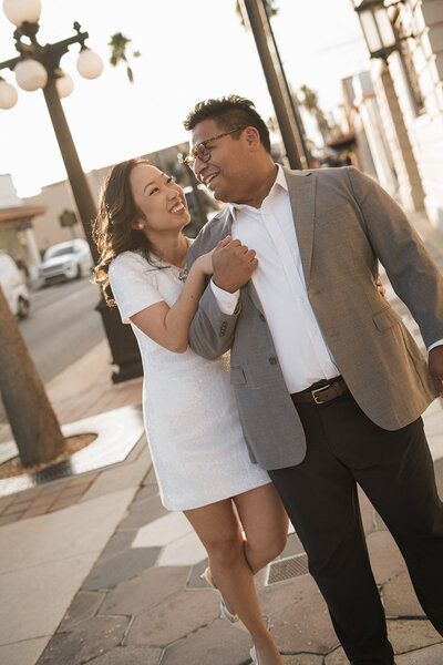 happy couple smiling city intimate wedding reception