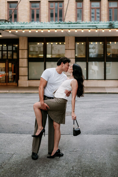 boyfriend dances with girlfriend in market square in knoxville tennessee