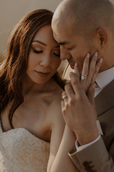 Bride and groom snuggle together during their Yosemite elopement