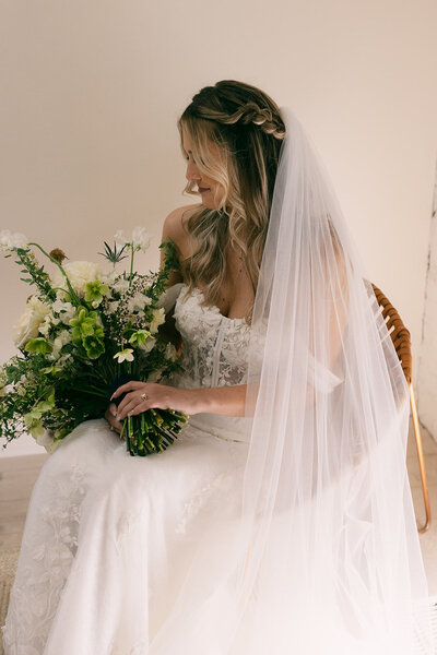 Bride sitting with her bouquet in Houston Texas