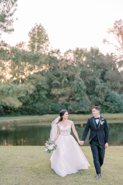 Couple in love walks near pond