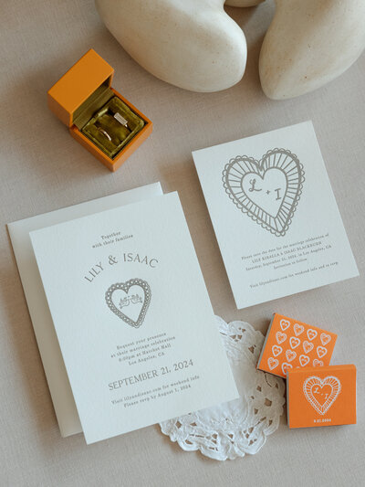 Orange and Cream Wedding Invitation Suite Flatlay