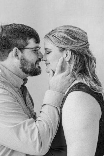 engaged couple looking at each other